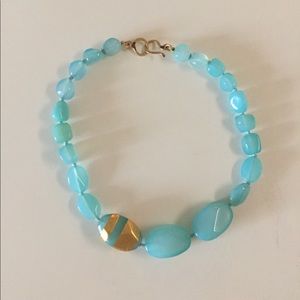 Teal Beads With Gold Design